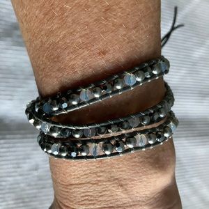 Wrap bracelet. Sliver and grey beads with grey leather.